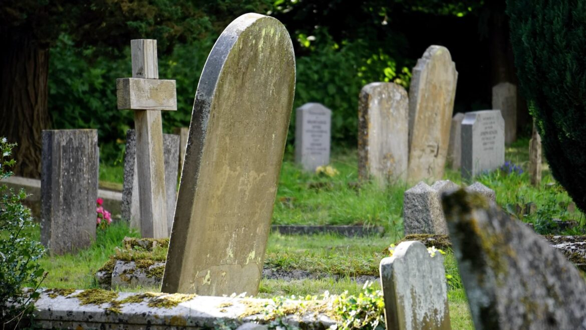 pexels-photo-116909 close up photography of concrete tombstones