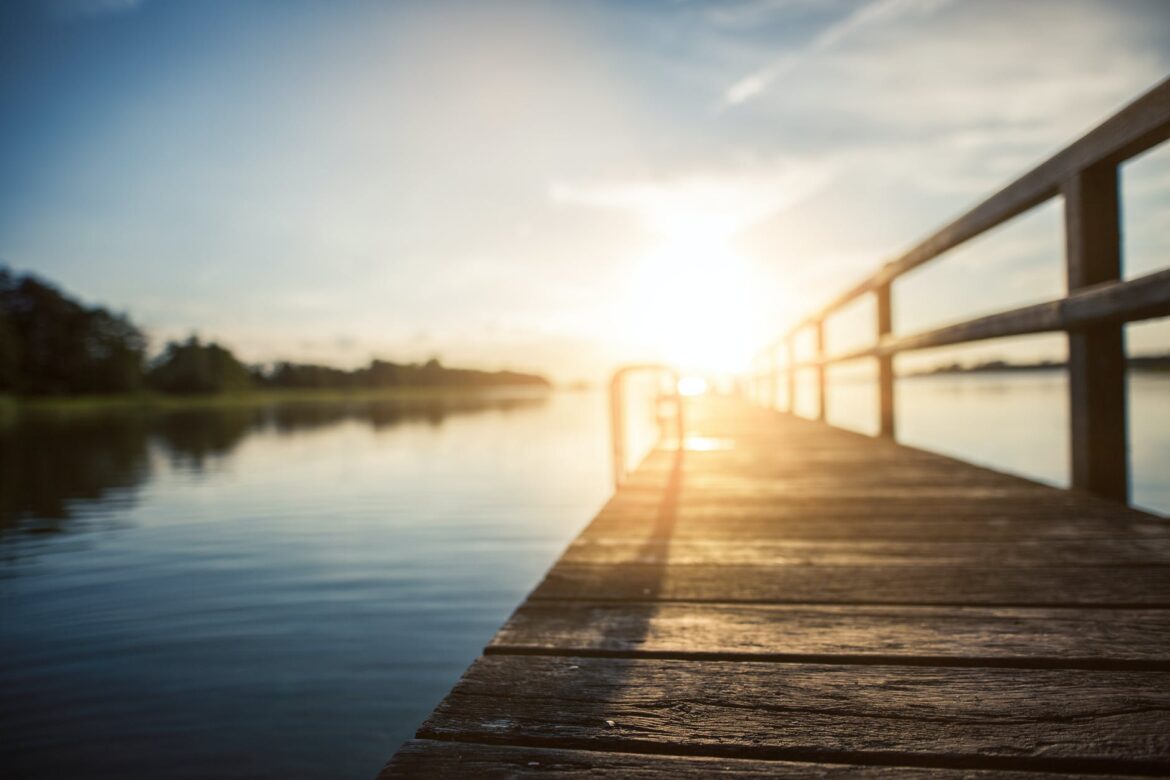 pexels-photo-205002 low angle photography of brown wooden dock at golden house