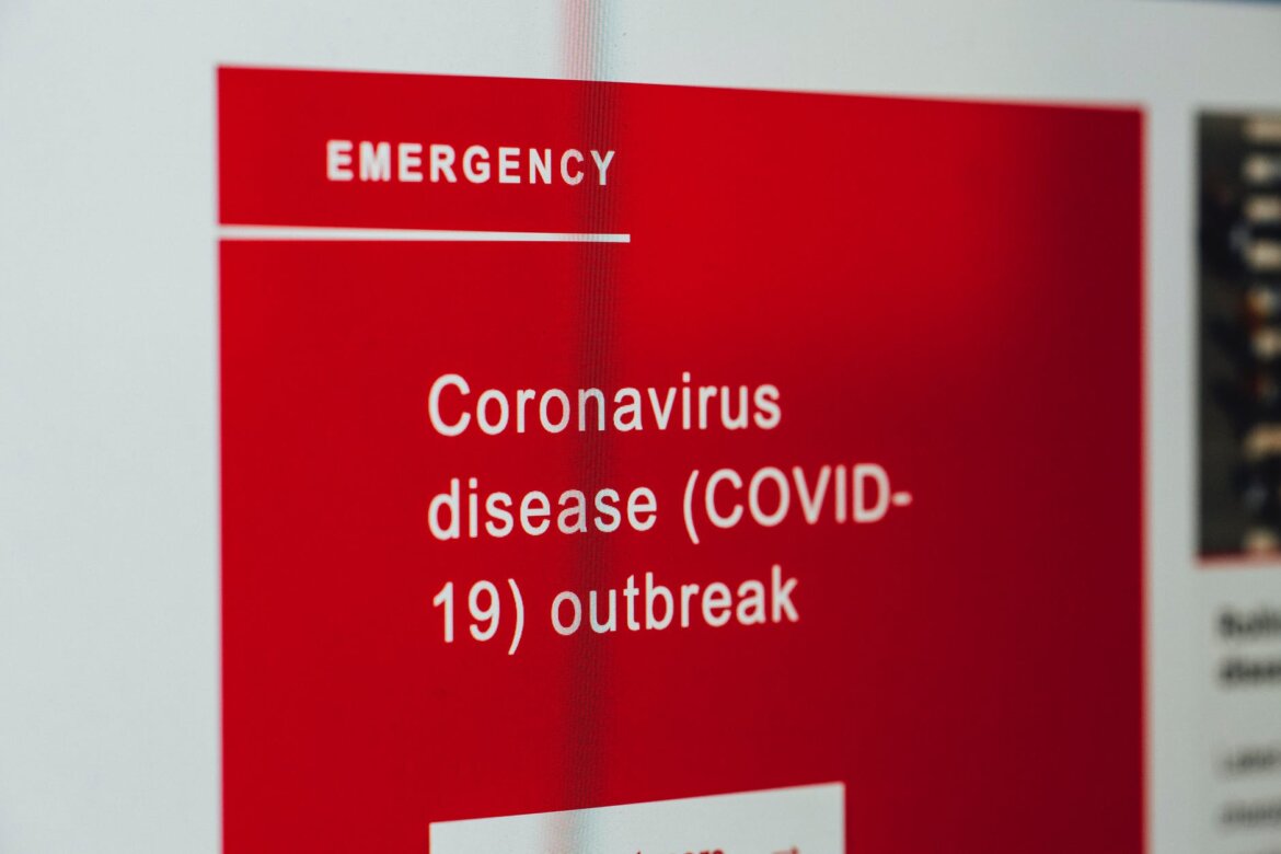 pexels-photo-3970332 coronavirus news on screen