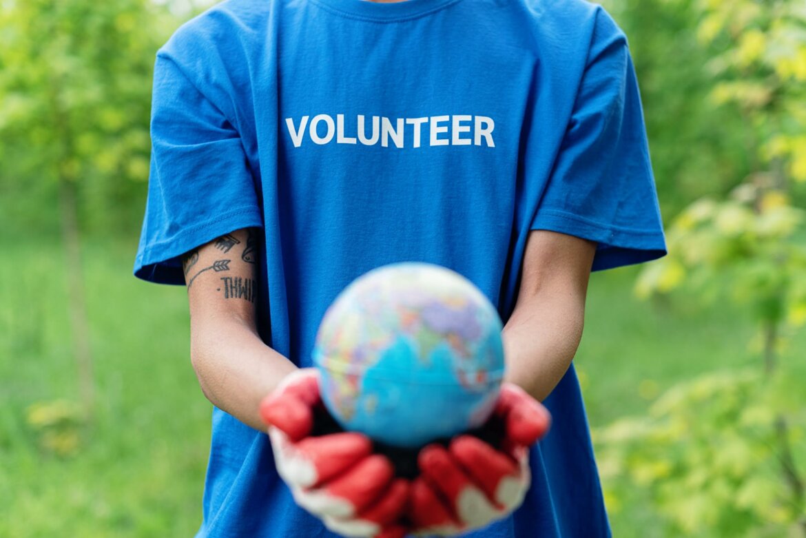 pexels-photo-8542565 close up shot of person holding a globe